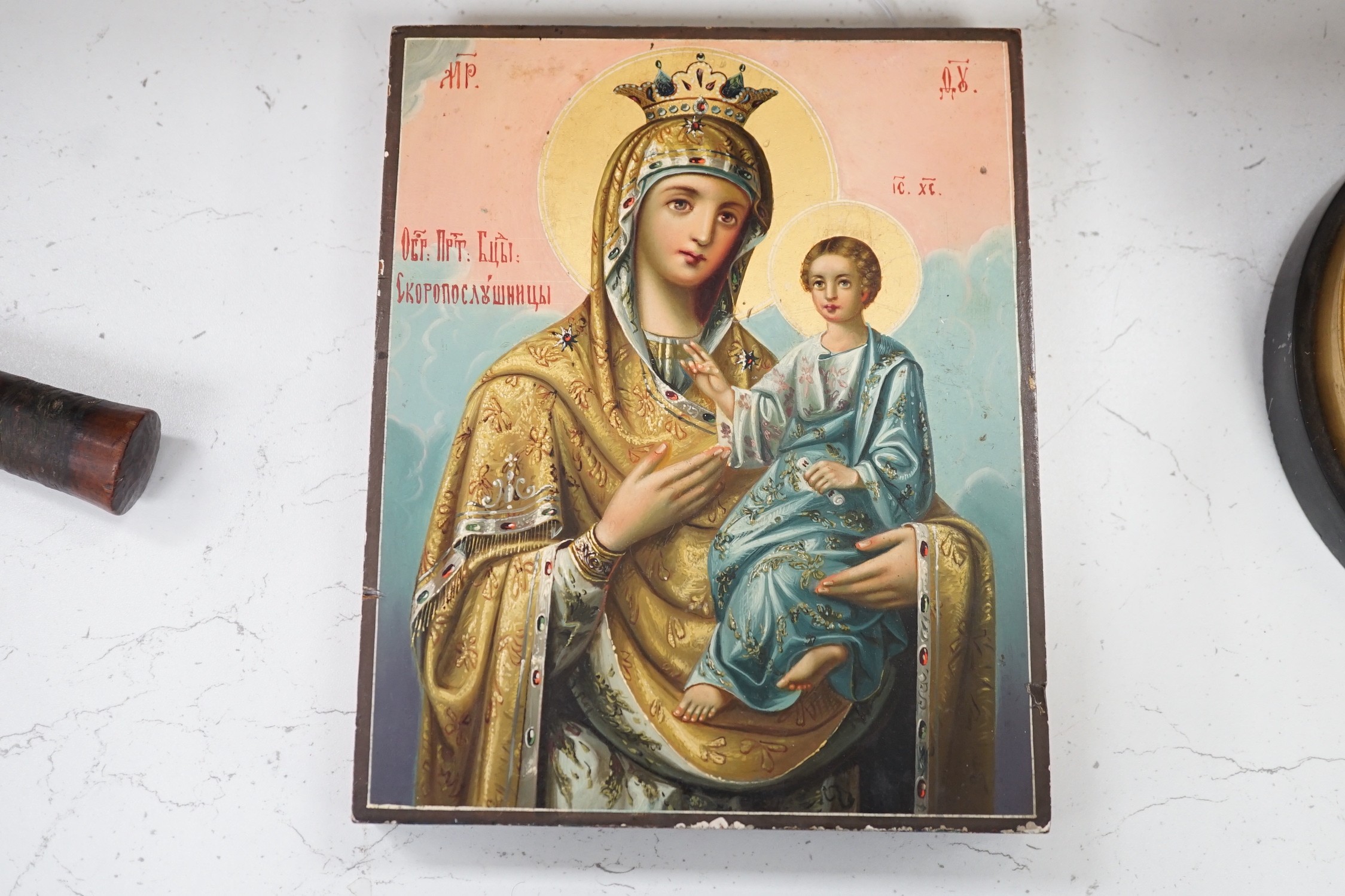 A Russian painted wood icon of Virgin and child, 22.5x18cm